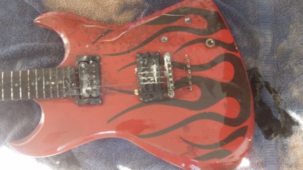 Fire Damaged Guitar's Ultimate Guitar